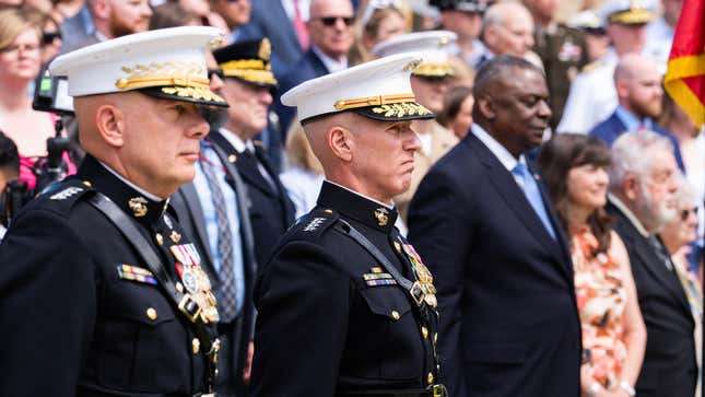 Former Marine Corps Commandant Gen. David Berger (left) and Gen. Eric Smith (right), acting commandant on Monday.