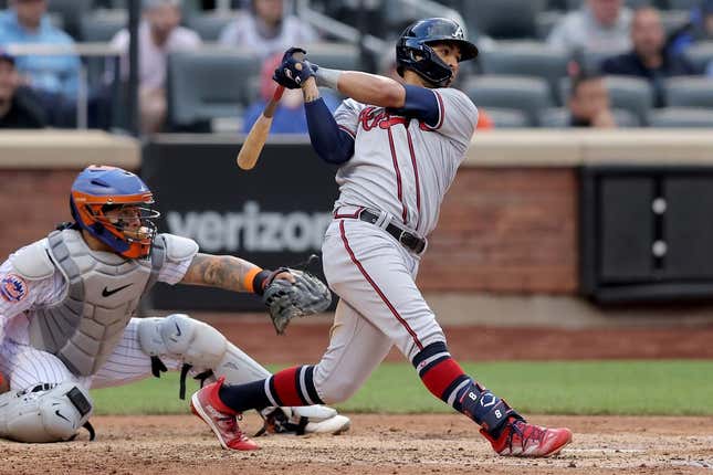 May 1, 2023; New York City, New York, USA; Atlanta Braves left fielder Eddie Rosario (8) follows through on a three run double against the New York Mets during the sixth inning at Citi Field.
