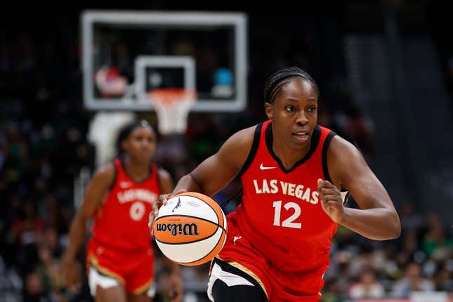 Chelsea Gray #12 of the Las Vegas Aces dribbles against the Seattle Storm during the first quarter in Game Four of the 2022 WNBA Playoffs semifinals at Climate Pledge Arena on September 06, 2022 in Seattle, Washington. (Photo by Steph Chambers/Getty Images)