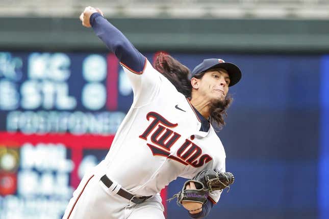 Apr 13, 2022; Minneapolis, Minnesota, USA; Minnesota Twins relief pitcher Dereck Rodriguez (32) throws to the Los Angeles Dodgers in the eighth inning at Target Field.