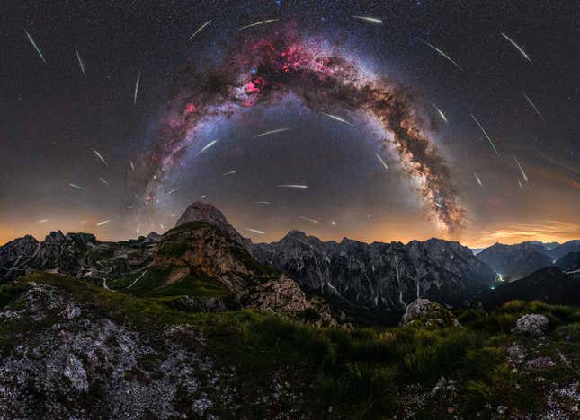 Meteors streak in front of the Milky Way in Slovenia.