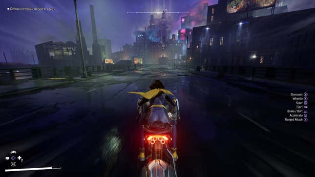 Batgirl takes to the streets on her motorcycle.