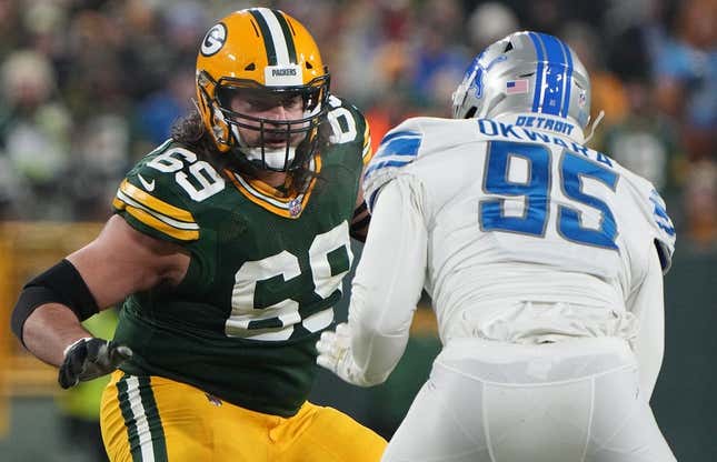 Jan 8, 2023; Green Bay, Wisconsin, USA; Green Bay Packers offensive tackle David Bakhtiari (69) provides pass protection while covering Detroit Lions linebacker Romeo Okwara (95) during the second quarter at Lambeau Field.