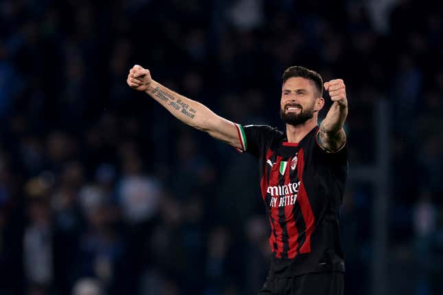 AC Milan’s Olivier Giroud celebrates after scoring a goal to give his side a 1-0 lead over Napoli