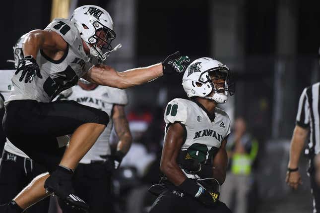 Aug 26, 2023; Nashville, Tennessee, USA; Hawaii Warriors wide receiver Pofele Ashlock (86) celebrates with running back Landon Sims (30) after a touchdown during the second half against the Vanderbilt Commodores at FirstBank Stadium.