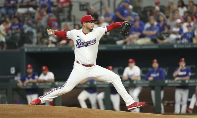 Jun 28, 2023; Arlington, Texas, USA;  Texas Rangers starting pitcher Dane Dunning (33) throws during the first inning against the Detroit Tigers at Globe Life Field.