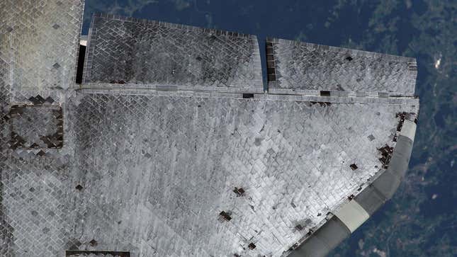 Discovery’s lower starboard wing and Thermal Protection System tiles, photographed on STS-114 during an R-Bar Pitch Manoeuvre where astronauts examine the TPS for any damage during ascent.