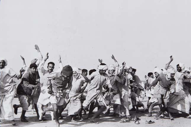 Games in a refugee camp at Kurukshetra, Punjab, India, 1947.