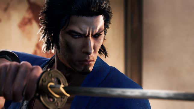 A samurai holds his sword at the ready.