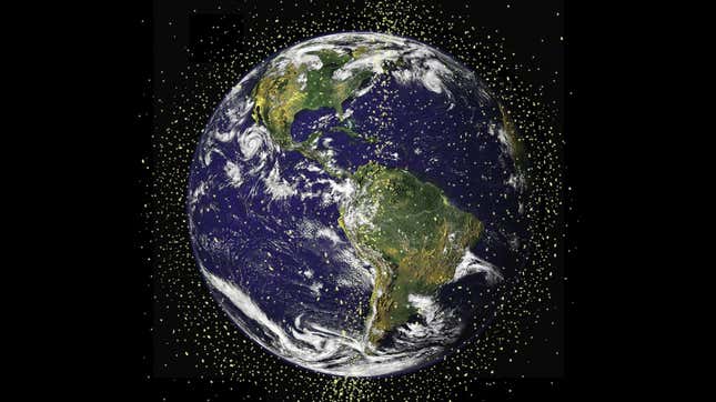 Imagen para el artículo titulado La Tierra podría acabar con anillos como los de Saturno, pero hechos de basura espacial