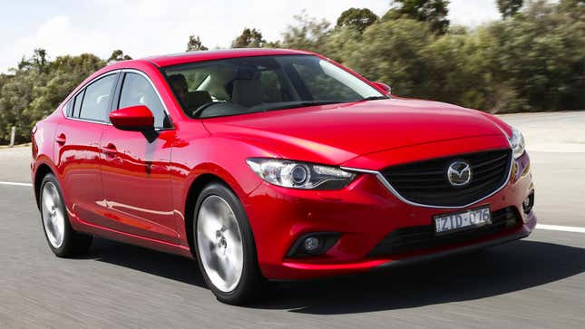 A photo of a red Mazda6 Sedan. 