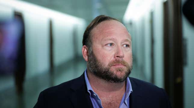 Alex Jones of InfoWars talks to reporters outside a Senate Intelligence Committee hearing concerning foreign influence operations’ use of social media platforms, on Capitol Hill, September 5, 2018 in Washington, DC. 