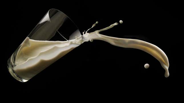 Image for article titled Got milk? Watch an Olympian swim a lap with a glass of milk balanced on her head