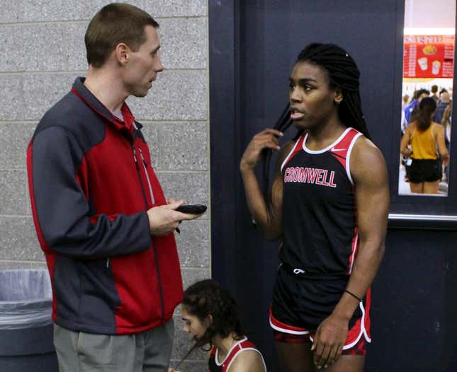 Andraya Yearwood talks to Cromwell High School track coach Brian Calhoun, February 7, 2019.