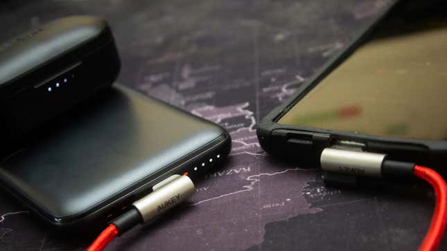 Image for article titled I Hated Power Banks Until I Used Aukey's 10,000mAh Kickstand-Bearing Wireless Charger