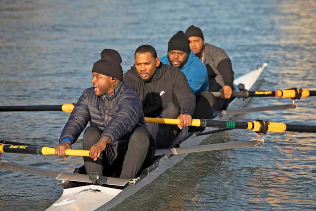 The Manley Team (Arshay Cooper in blue sweatshir) on the water in Oakland. 

