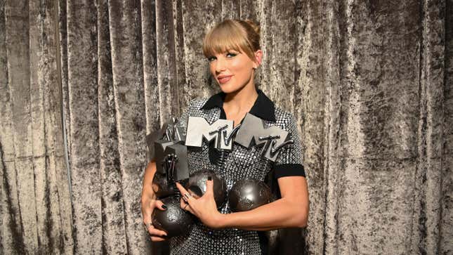 DUESSELDORF, GERMANY - NOVEMBER 13: Taylor Swift is seen backstage with the Best Artist, Best Video, Best Pop and Best Longform Video Awards during the Best MTV Europe Music Awards 2022 held at PSD Bank Dome on November 13, 2022 in Duesseldorf, Germany. (Photo by Dave J Hogan/Getty Imges for MTV)