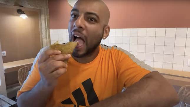 A screenshot of Spanish YouTuber Borja Escalona eating an empanadilla is shown.
