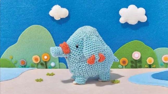 Phanpy made out of wool, in a lovely bucolic backdrop.