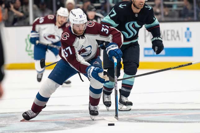 April 24, 2023;  Seattle, Washington, USA;  Colorado Avalanche forward JT Comper (37) skates with the puck in game four of the first round of the 2023 Stanley Cup playoffs against the Seattle Kraken at Climate Pledge Arena.