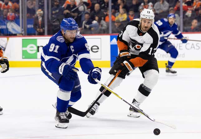 Dec 1, 2022; Philadelphia, Pennsylvania, USA; Tampa Bay Lightning center Steven Stamkos (91) and Philadelphia Flyers center Kevin Hayes (13) in action during the second period at Wells Fargo Center.