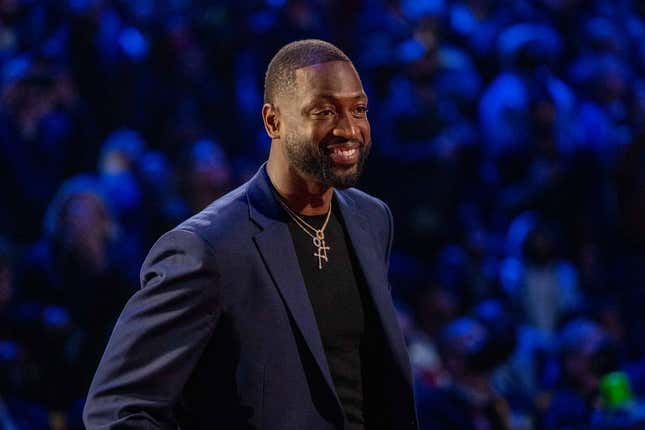 February 20, 2022; Cleveland, Ohio, USA; NBA great Dwyane Wade is honored for being selected to the NBA 75th Anniversary Team during halftime in the 2022 NBA All-Star Game at Rocket Mortgage FieldHouse.