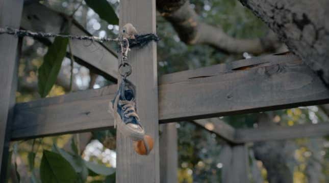 marcel on a string with a shoe