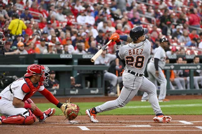 May 5, 2023; St. Louis, Missouri, USA;  Detroit Tigers shortstop Javier Baez (28) hits a two run home run against the St. Louis Cardinals during the first inning at Busch Stadium.