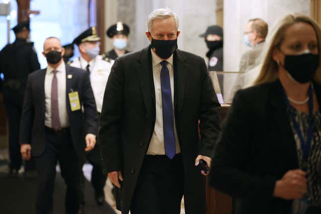 Former White House Chief of Staff Mark Meadows (C) arrives at the US Capitol for the first day of former President Donald Trump’s second impeachment trial in the Senate on February 09, 2021, in Washington, DC. 