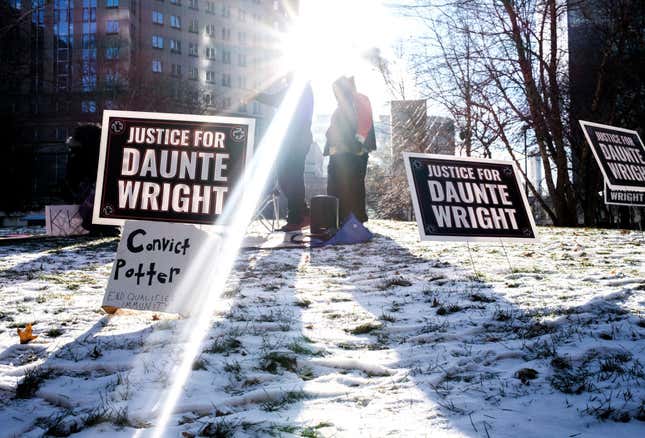 People demonstrate in support of the family of Daunte Wright outside the Hennepin County Government Center on December 20, 2021, in Minneapolis, Minnesota.