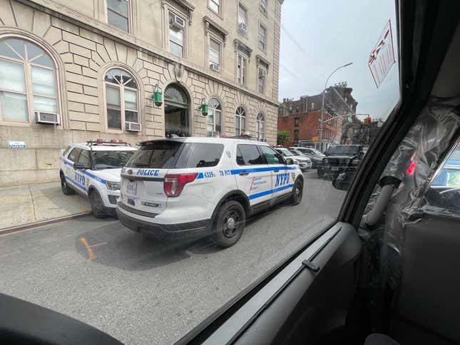 Cop cars may not be faster than their civilian counterparts, but they do get to park in a lane of traffic facing the wrong way, messing up the roads for blocks in every direction, without fear of penalty