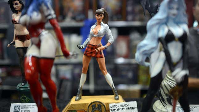 Collectible statues of women characters in various stages of undress at Comic Con 2012