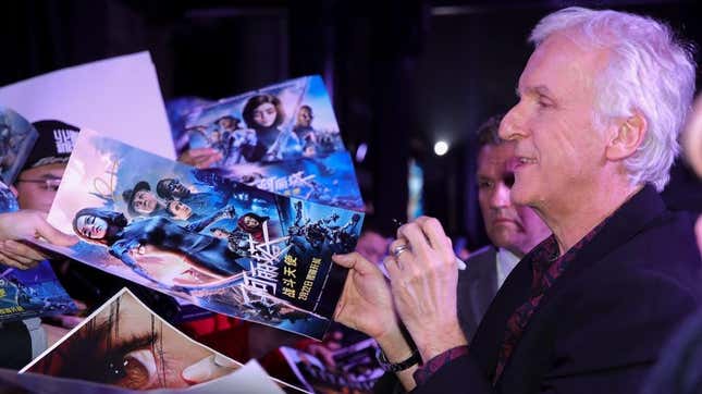 James Cameron signing Alita posters in 2019.