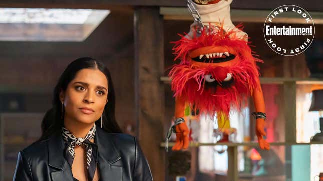 Animal the Muppet and human character Nora (Lilly Singh) in The Muppets Mayhem