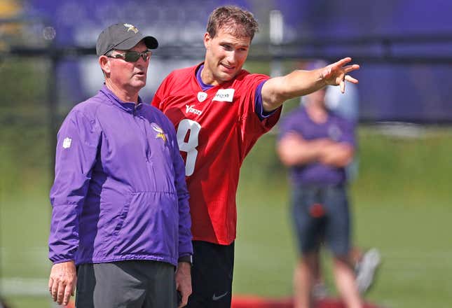 Kirk Cousins gestures toward mediocrity  as Mike Zimmer looks on.