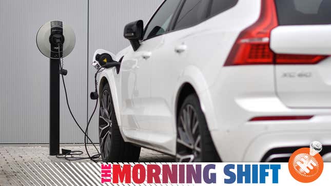 A Volvo XC60 hybrid car is seen plugged into a charging point outside a Volvo dealership in Reading, west of London, on March 2, 2021. - Chinese-owned Swedish automaker Volvo said on March 2 it will produce only electric vehicles by 2030 and sell them all exclusively online.
