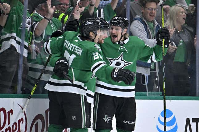 May 11, 2023; Dallas, Texas, USA; Dallas Stars left wing Jason Robertson (21) and defenseman Thomas Harley (55) and center Roope Hintz (24) celebrates a goal scored by Hintz against the Seattle Kraken during the first period in game five of the second round of the 2023 Stanley Cup Playoffs at American Airlines Center.