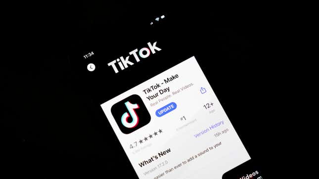In this photo illustration, the download page for the Tiki Tok app is displayed on an Apple iPhone on August 7, 2020 in Washington, DC. On Thursday evening, President Donald Trump signed an executive order that bans any transactions between the parent company of TikTok, ByteDance, and U.S. citizens due to national security reasons.