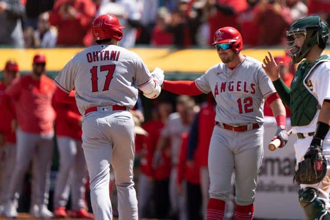 Apr 2, 2023; Oakland, California, USA;  Los Angeles Angels designated hitter Shohei Ohtani (17) celebrates with right fielder Hunter Renfroe (12) after hitting a solo home run during the fifth inning against the Oakland Athletics at RingCentral Coliseum.