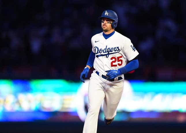Apr 1, 2023; Los Angeles, California, USA; Los Angeles Dodgers center fielder Trayce Thompson (25) runs to home after hitting a home run against the Arizona Diamondbacks during the fifth inning at Dodger Stadium.