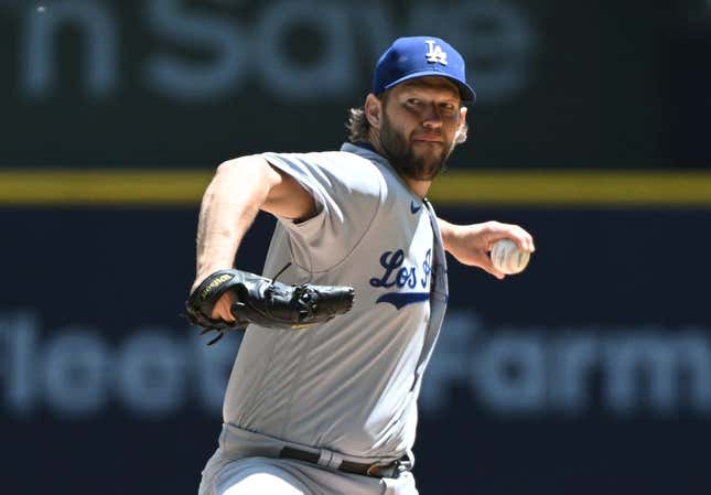 May 10, 2023; Milwaukee, Wisconsin, USA; Los Angeles Dodgers starting pitcher Clayton Kershaw (22) delivers a pitch against the Milwaukee Brewers in the first inning at American Family Field. The Los Angeles Dodgers 8, Milwaukee Brewers 1.