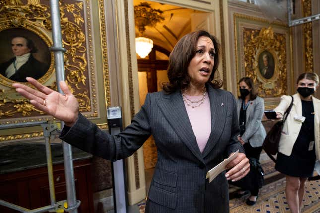 Vice President Kamala Harris stops to speak to reporters after casting the tie breaking vote to pass the Inflation Reduction Act in the Capitol on Sunday, August 7, 2022. 