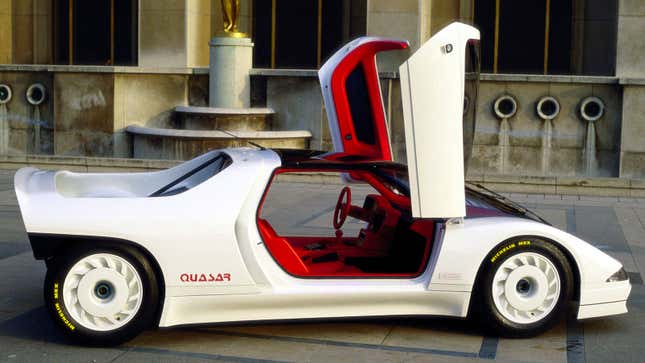 A photo of the Peugeot Quasar concept with its futuristic doors open. 