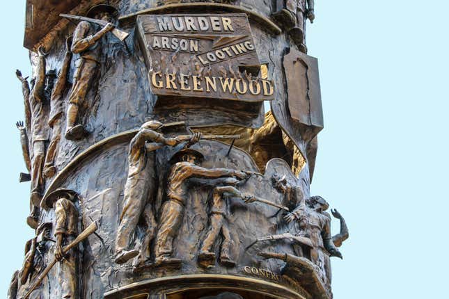 Close-up detail of The Tower of Reconciliation taken on July 20, 2021 in Hope Park. The statue depicts the Tulsa race riot that took place near this public park. 