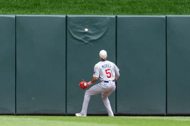 May 14, 2023; Minneapolis, Minnesota, USA; Chicago Cubs center fielder Christopher Morel (5) plays a Minnesota Twins second baseman Nick Gordon (1) hit off the wall in the bottom of the third at Target Field.