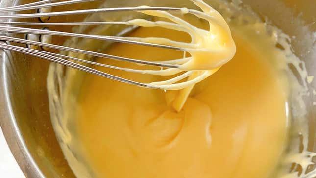 Image for article titled Make This Gooey, Stretchy Cheese Sauce With Lemon Juice and Baking Soda