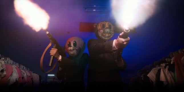 Two assassins wearing cartoon-character masks.