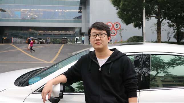 Uber driver Tommy Wu with his Mazda6 sedan.