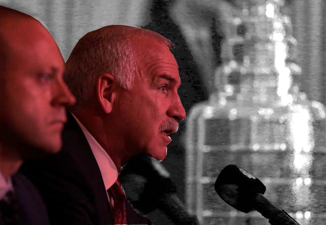 Former Chicago Blachawks coach Joel Quenneville, right, has a lot to answer for in his role in covering up sexual assault allegations from 2010. GM Stan Bowman, left, resigned on Tuesday.