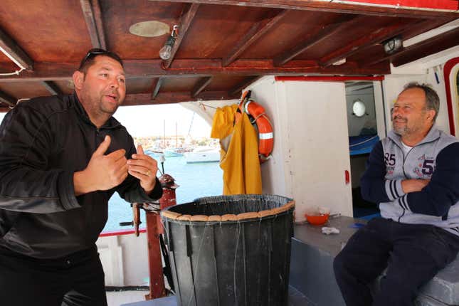 Fishermen Maurizio Brichetto and Filippo Solina, remember rescuing migrants off she shore of Lampedusa.